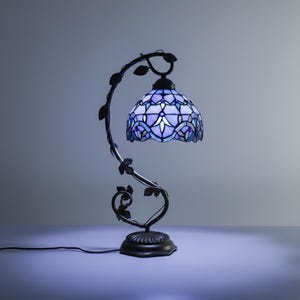 Blue Tiffany-Style Table Lamp with Ornate Metal Leaf Base