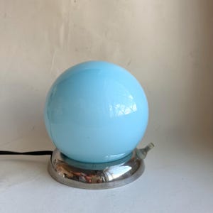 Metal and light blue glass table lamp. 1960s bedside lamp. Home decor. Ball lamp.